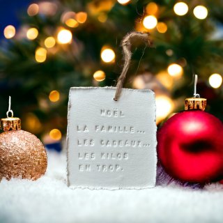Plaque « Noël: Famille Cadeaux Kilos »